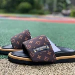 LOUIS VUITTON Slides Black Brown