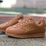 路易威登 x Nigo 联名米色足球鞋 FW25